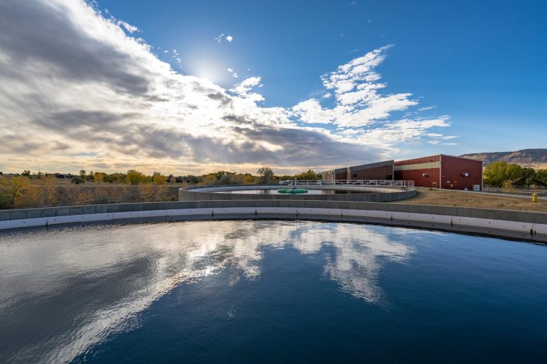 The sun reflects off of a treatment pond at the Ralston Water Treatment Plant in Arvada.