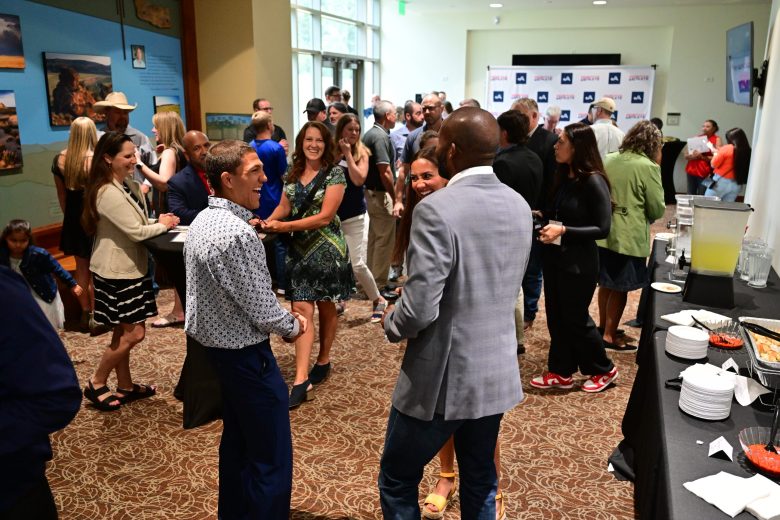 Pro Football Hall of Famer and Broncos legend Champ Bailey speaks with parents and attendees of the Positive Athlete Awards Ceremony at the Douglas County School District Legacy Campus in Lone Tree on June 2.