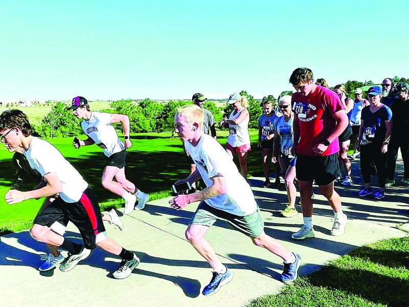 The 2022 Cardinal Club Independence Day 5K is shown beginning at Evans Park.