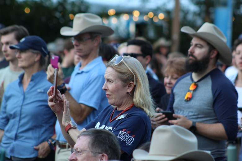 Colorado School of Mines alumni, students and other supporters watch the Sesquicentennial Bell's unveiling in front of Guggenheim Hall Sept. 27