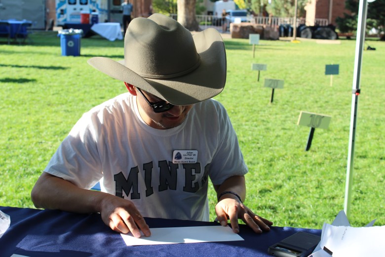 Colorado School of Mines alumnus Julian Liu competes in the paper airplane contest the Sept. 27 Blaster's Bash event celebrating the university's 150th anniversary