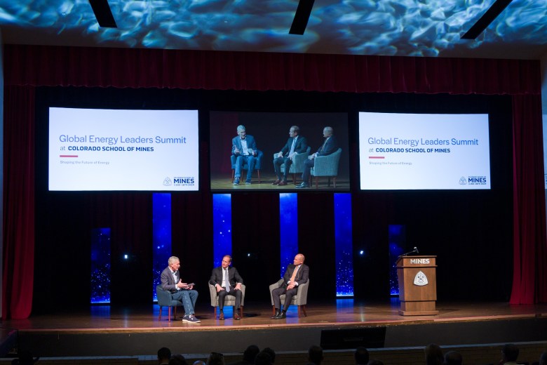 Colorado School of Mines President Paul C. Johnson, left, talks with Dave Lawler and Robert D. (Doug) Lawler Sept. 26 at Mines' Global Energy Leaders Summit