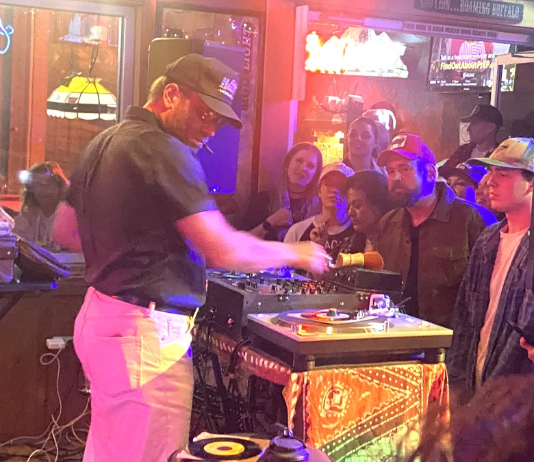 man at record booth