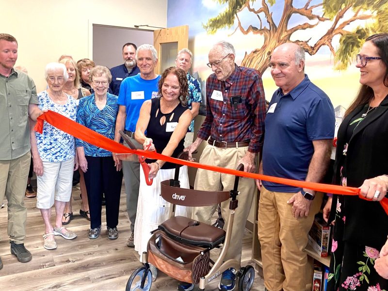 people at a ribbon cutting