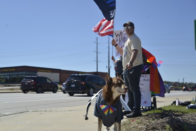 A dog joins a protest.