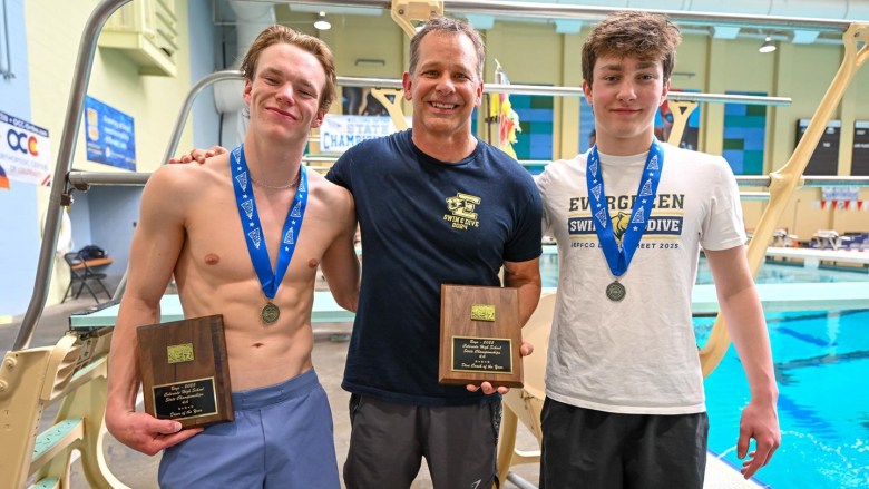 Evergreen High School senior Carson Harrington (left), Coach Brett Brinkhoff (middle) and junior Henry Palmquist pose for a photo with their hardware from the Class 4A swimming and diving state championships. Harrington broke the state diving record with a score of 696.10, while Palmquist finished runner-up at 562.85. Brinkhoff was named the 4A Dive Coach of the Year from the Colorado High School Coaches Association.