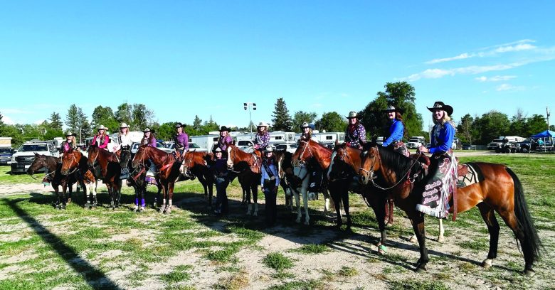Visiting royalty, including Elizabeth Stampede and Elbert County Fair queens and attendants, led and participated in the Grand Entry each night at the Cowboy Up In Kiowa Rodeo.
