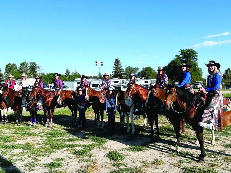 Visiting royalty, including Elizabeth Stampede and Elbert County Fair queens and attendants, led and participated in the Grand Entry each night at the Cowboy Up In Kiowa Rodeo.