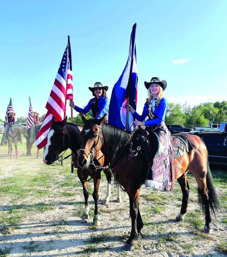 Elizabeth Stampede Queen Kallie Russell and Attendant Georgia Swanson attend the Cowboy Up in Kiowa Rodeo.
