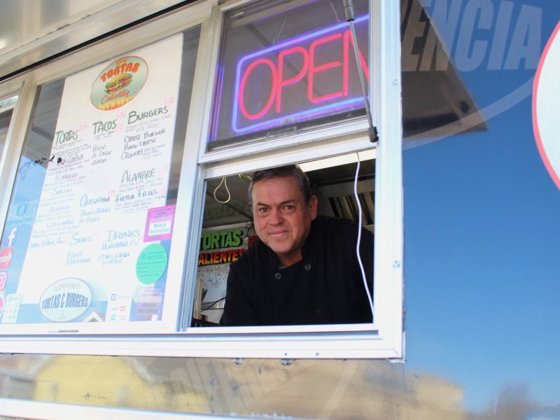On March 11, José “Pepe” Garayoa looks through the window of his Ricas Tortas Calientes food truck