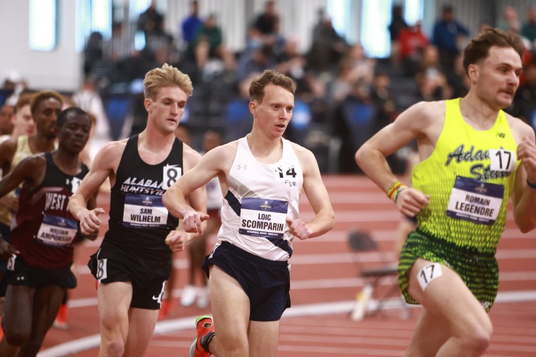 Colorado School of Mines runner Loic Scomparin, center, competes in the men's 3K race at the NCAA Division II Indoor Track & Field Championships