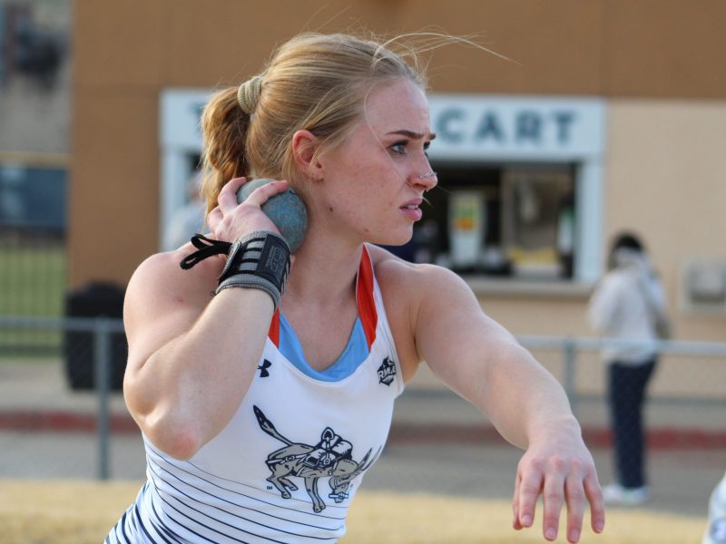 Colorado School of Mines redshirt senior Abbi Gillespie warms up for the women's shot put at the March 27 Mines Midweek Meet.