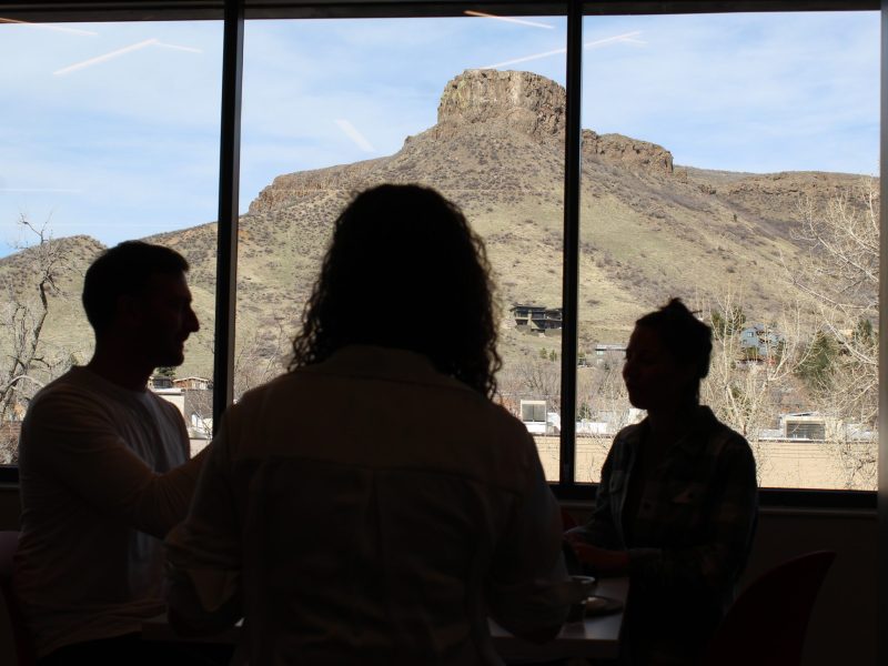 On April 4, Colorado School of Mines students work on the third floor of the new Beck Venture Center, which has windows looking out at South Table Mountain. The three-story building offers a variety of individual work stations and meeting areas for Mines students and their collaborators.