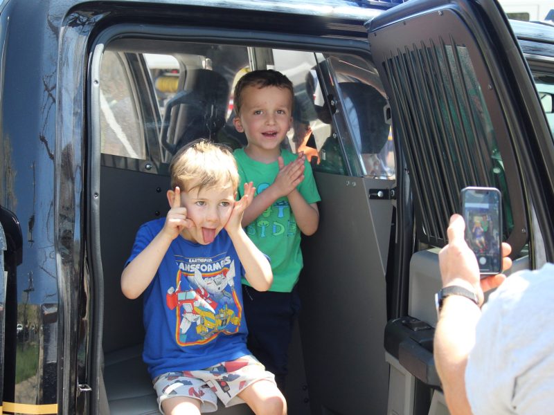 On April 26, 5-year-olds Arlo Hoffman, left, and Hunter Hamblin pose for a photo for their families inside a Golden Police Department vehicle