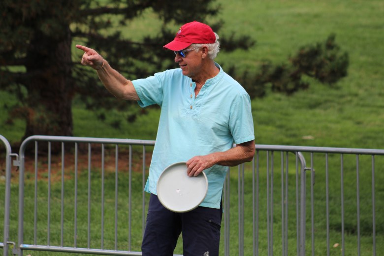 Dan Ross throws a disc with his son and grandson during Golden's 4th of July Festival at Lions Park.