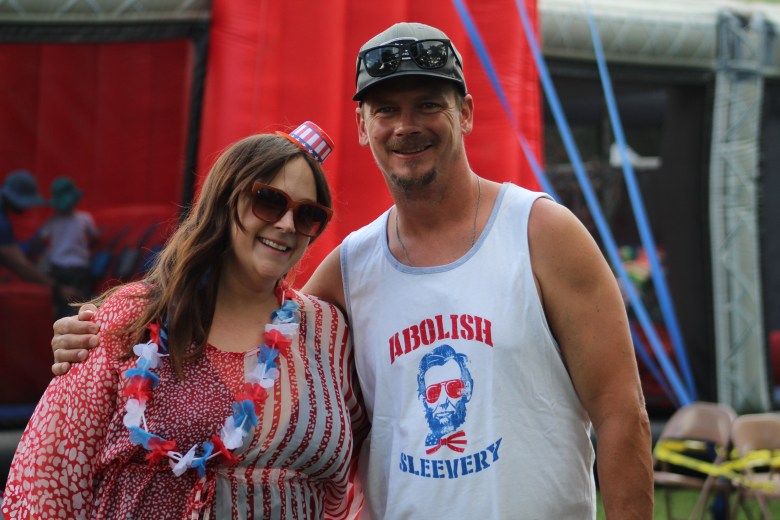 Kendra and Zak Zimmer wear red-white-and-blue attire during Golden's 4th of July Festival at Lions Park.