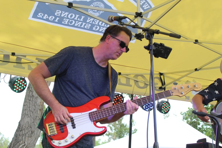 A member of Jeff Goodwin and the Front Range Cowboys performs during Golden's 4th of July Festival at Lions Park.