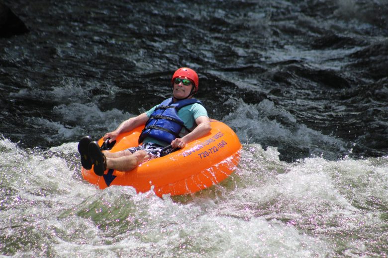 On June 28, a tuber bounces along Golden's section of Clear Creek near the U.S. Highway 6 bridge