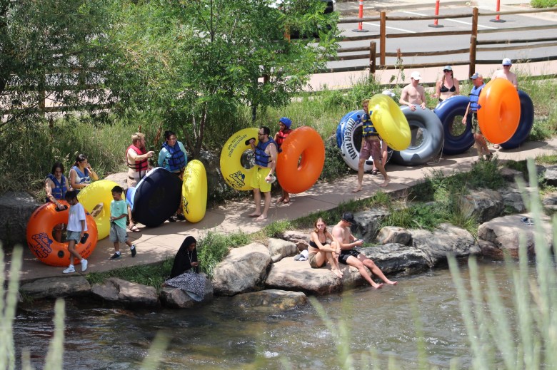 On June 28, tubers line up to put their innertubes in Clear Creek near Lions Park.