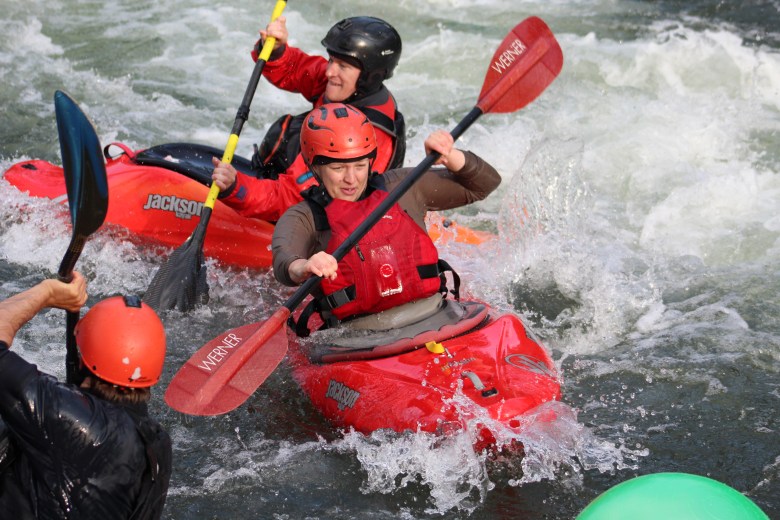 Teams H2O and 3 Broke Girls compete in the Colorado Whitewater Association's July 10 downriver race at the Clear Creek Whitewater Park.