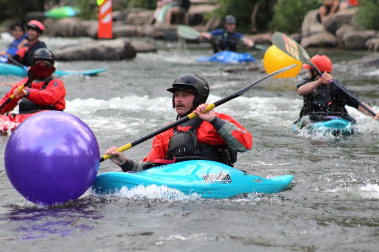 Kayakers compete in the Colorado Whitewater Association's July 10 downriver race at the Clear Creek Whitewater Park.