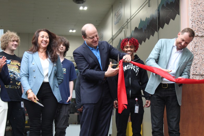 On July 16, Colorado Gov. Jared Polis, center, and CoorsTek representatives cut the ribbon for the CoorsTek Academy Training Center.