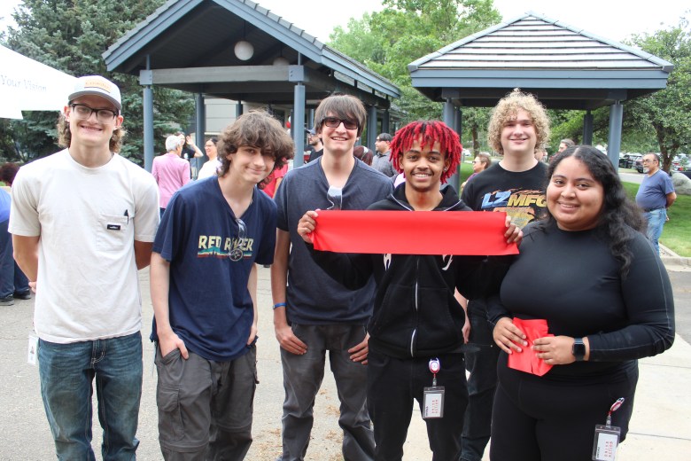 The six members of the first CoorsTek Academy Training Center apprenticeship cohort celebrate the academy's July 16 ribbon-cutting ceremony