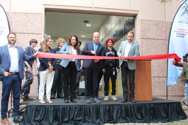 On July 16, Colorado Gov. Jared Polis, center, and CoorsTek representatives cut the ribbon for the CoorsTek Academy Training Center