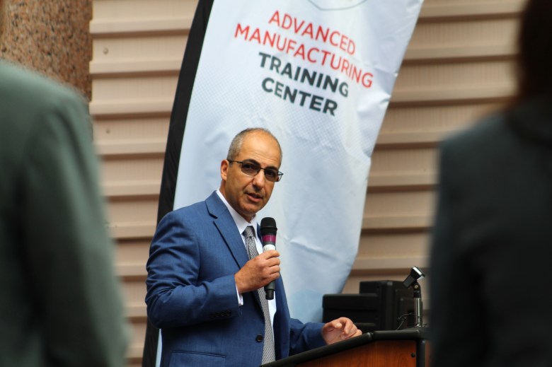 Billy Mansour, Emerson's vice president of North America operations, speaks at the July 16 ribbon-cutting ceremony for the CoorsTek Academy Training Center.