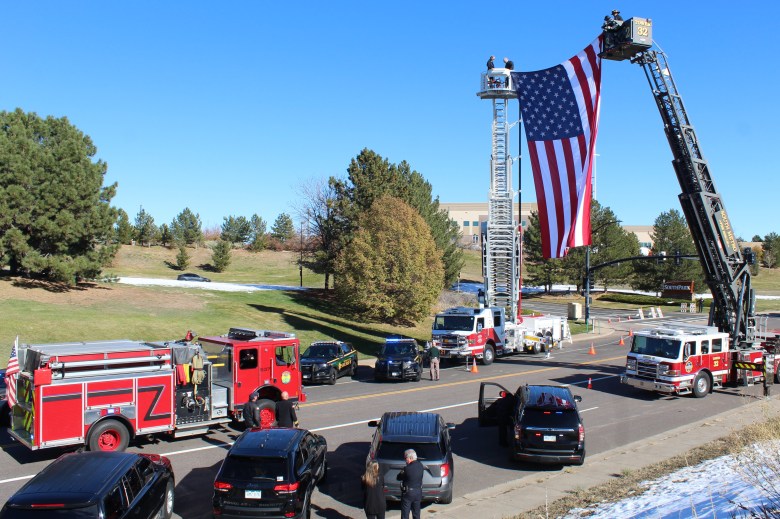 On Nov. 13, local first responders arrange their vehicles along County Line Road ahead of Golden Police Officer Evan Dunn's funeral procession.