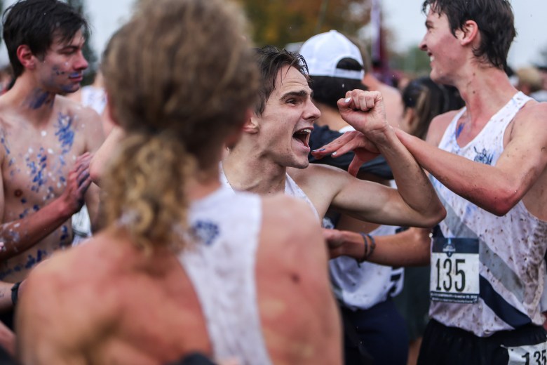 On Nov. 23, members of the Colorado School of Mines men's cross country team celebrate winning the NCAA Division II national championship.