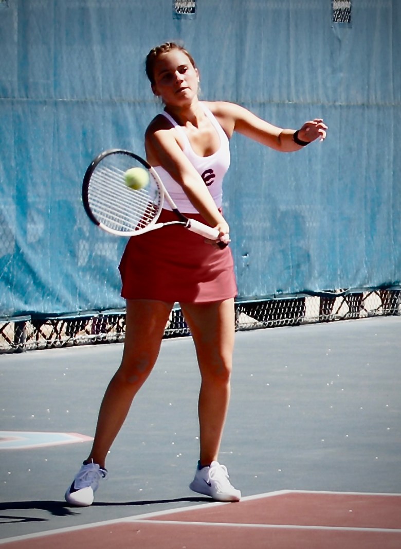 Cherry Creek's Zoe Hochstadt hits a forehand return. She won the No. 3 singles title at the Denver East/Cherry Creek tennis tournament on April 12 with a 6-2, 6-0 win over Lara Seager of Fort Collins.