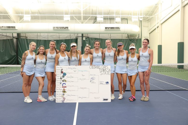 Ralston Valley girls tennis poses for a photo showing their undefeated Class 5A bracket. The Mustangs finished the season undefeated to repeat as 5A champions from last year.