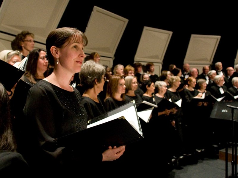 People sing in a choir