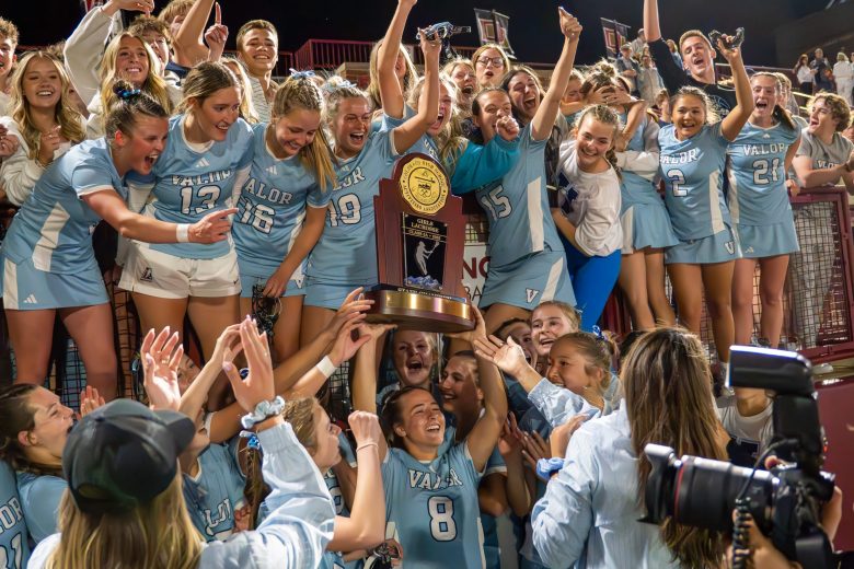 The Valor Christian girls lacrosse team celebrates after beating ThunderRidge 12-8 in the Class 5A state championship game on May 16 at the University of Denver.