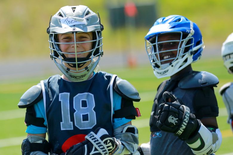 Youth boys lacrosse players pose for a photo at a previous camp held by Evergreen High School's lacrosse program. The Cougars announced another camp this July 30, 31 and Aug. 1 at the high school.