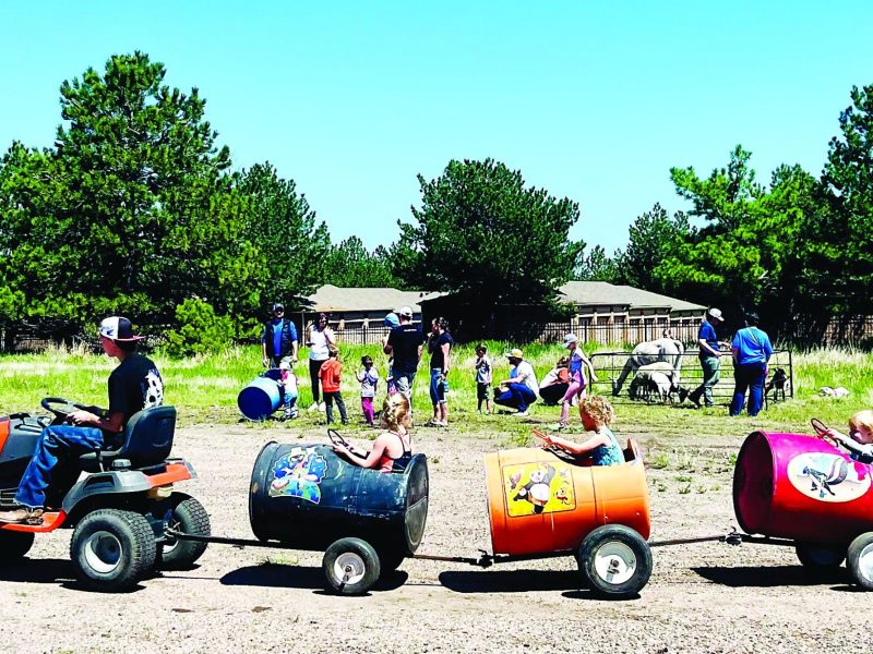 Catching a ride on the Barrel Train was a popular option at the Pines & Plains Libraries Summer Reading Program Kickoff on May 31.